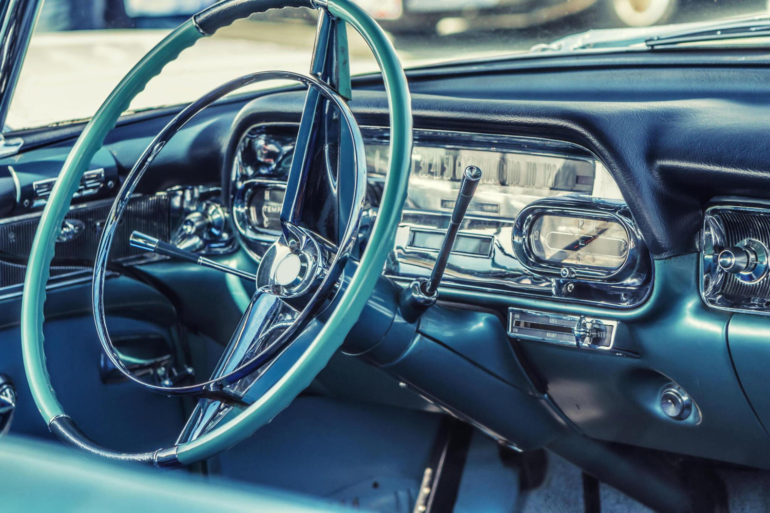 Classic car dashboard showing original radio after Bluetooth retrofit