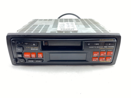 Alpine TDM-7554RM vintage cassette car radio front view with RCA outputs