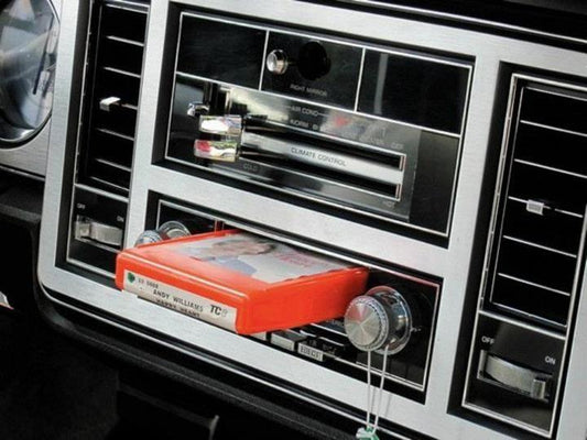 Vintage 1970s 8 track car radio in dashboad