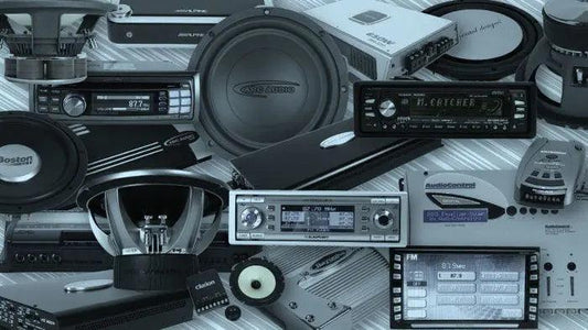 car radios and speakers from 1960 to 2010 in grey background