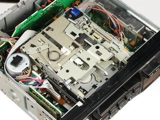 Car radio cassette deck mechanism