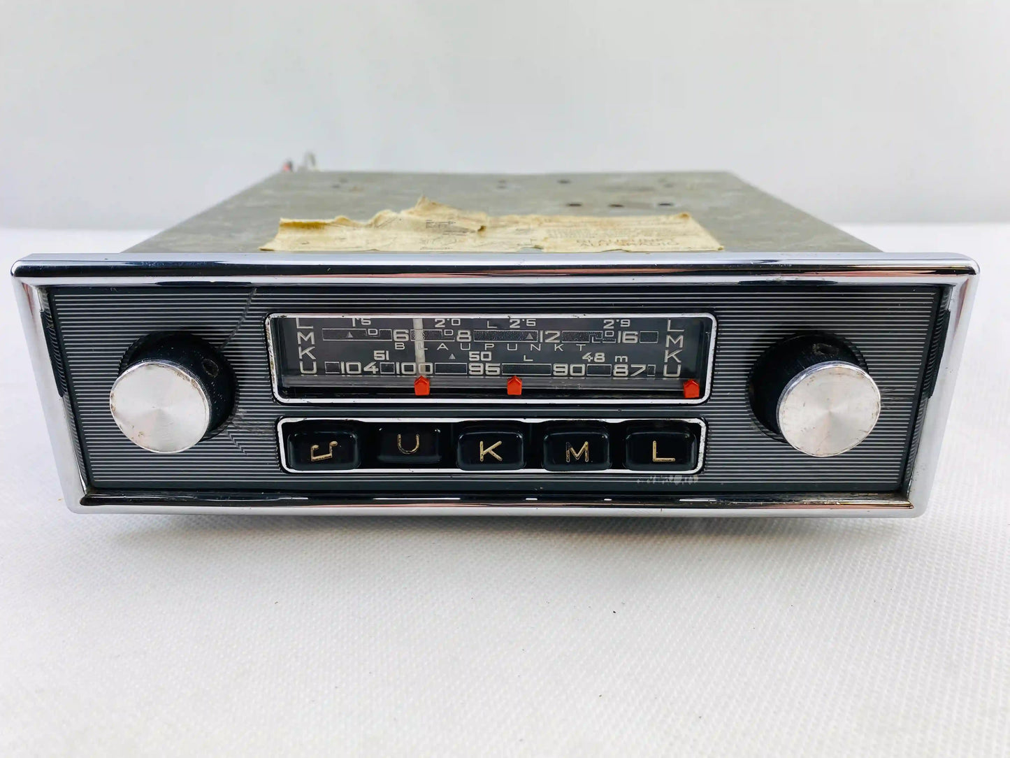 1960s Blaupunkt Essen FM vintage car radio front view with chrome knobs and push buttons