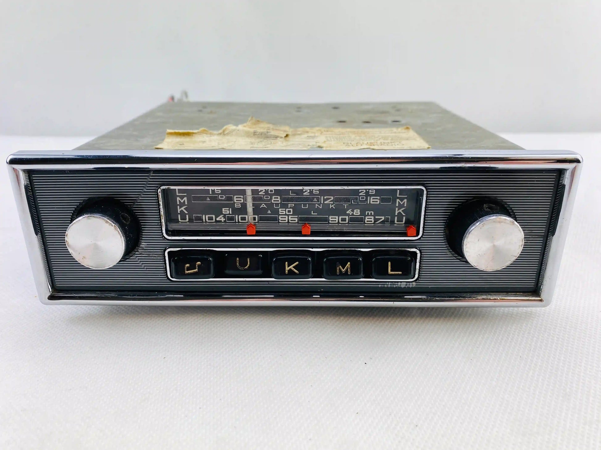 1960s Blaupunkt Essen FM vintage car radio front view with chrome knobs and push buttons