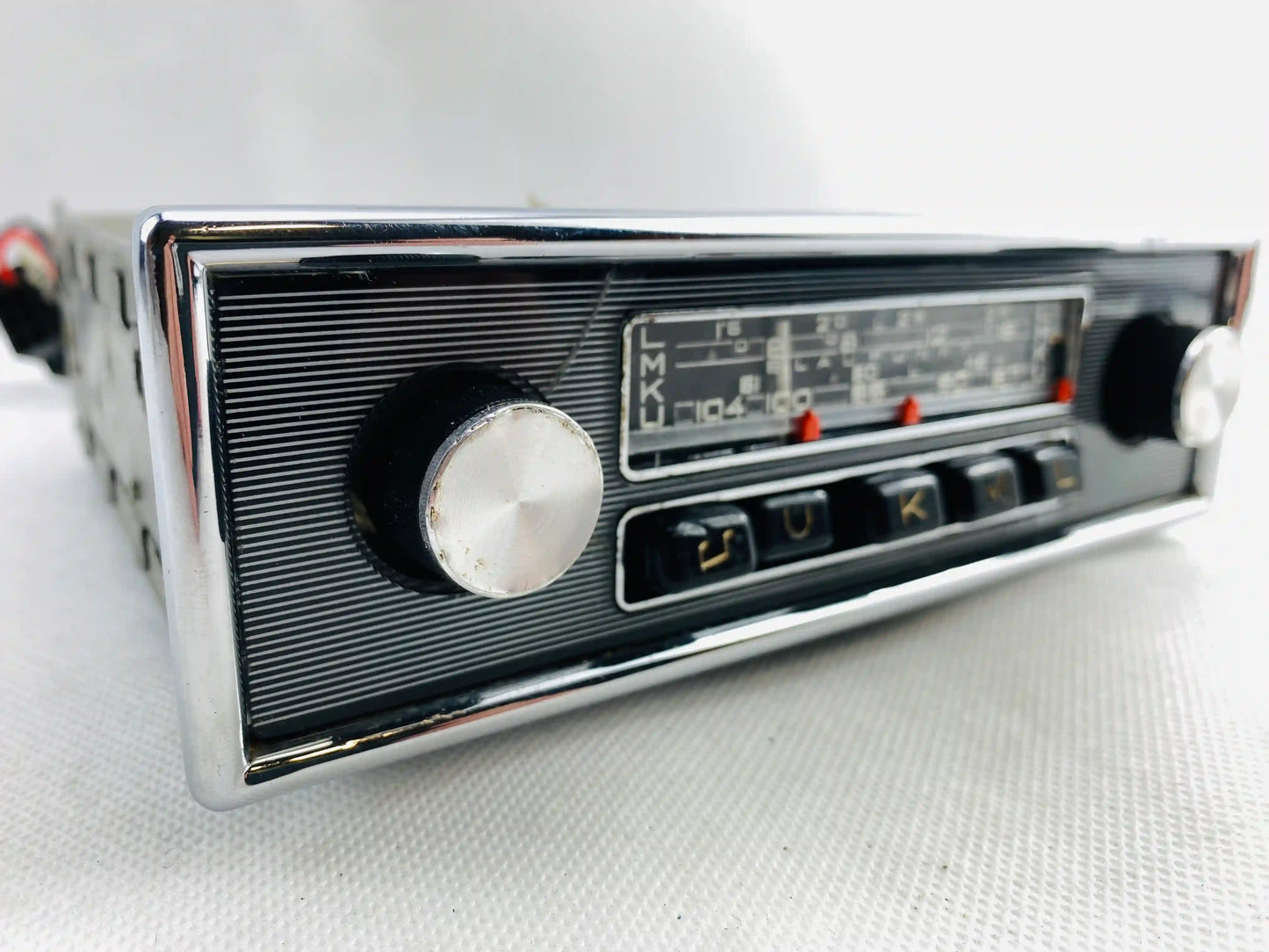 1960s Blaupunkt Essen FM classic car radio left angled view showing chrome volume knob