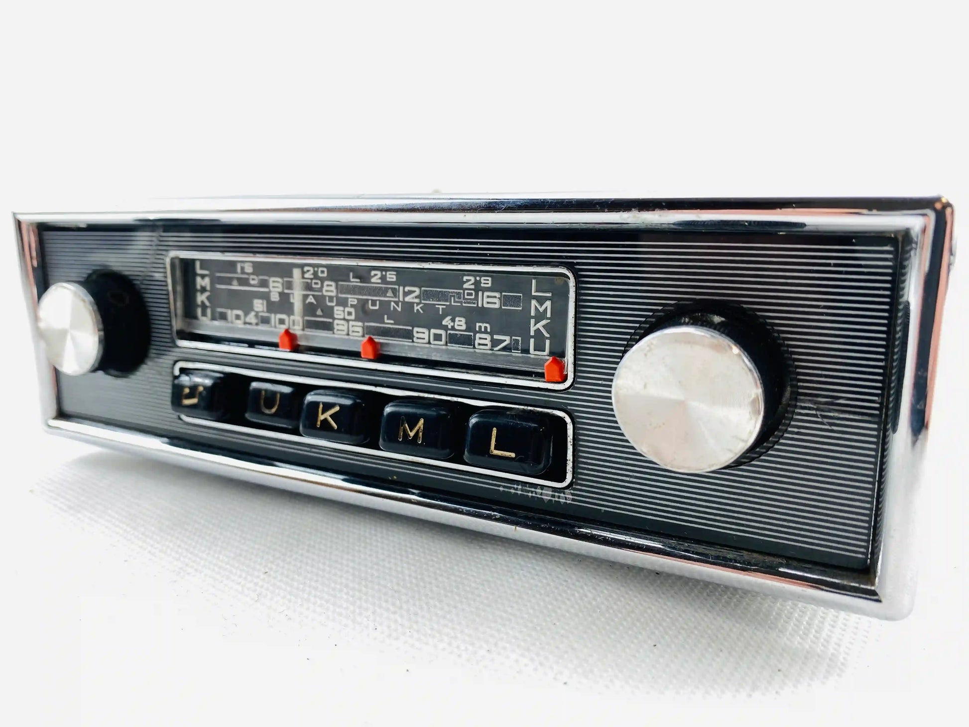 1960s Blaupunkt Essen FM vintage car radio right angled view with chrome tuning knob