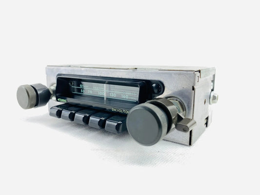 1970s Clarion vintage radio left angled view installed in classic Nissan Datsun