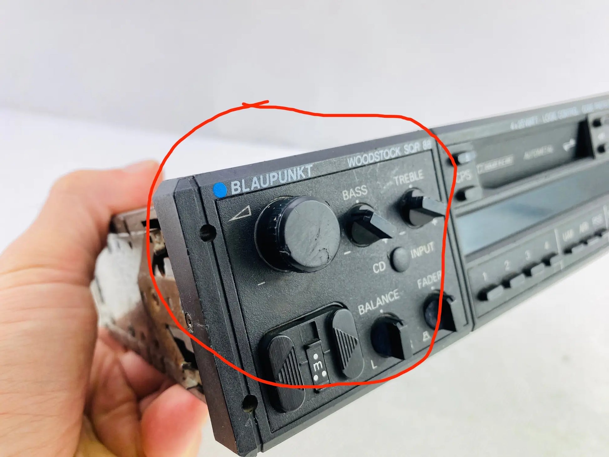 1980s Blaupunkt Woodstock SQR 88 car cassette radio angled front view showing cassette deck and control panel