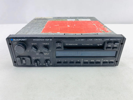 1980s Blaupunkt Woodstock SQR 88 car cassette radio full front view with preset buttons and balance fader controls