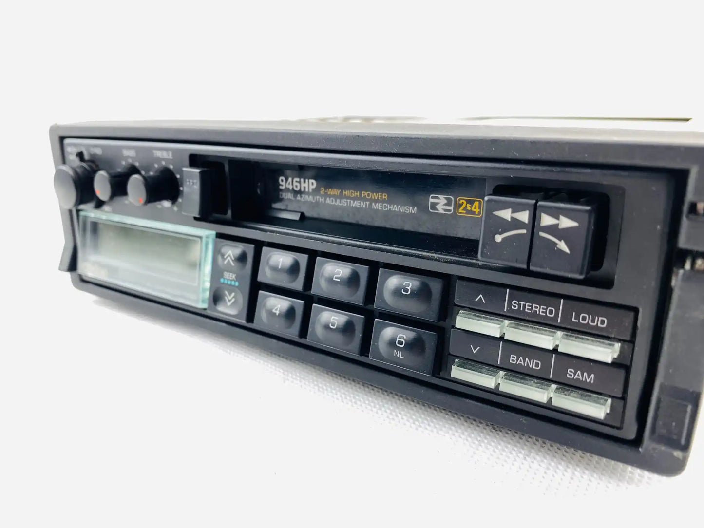 1980s Clarion 946HP car cassette radio player front left angled perspective showing cassette deck and control knobs