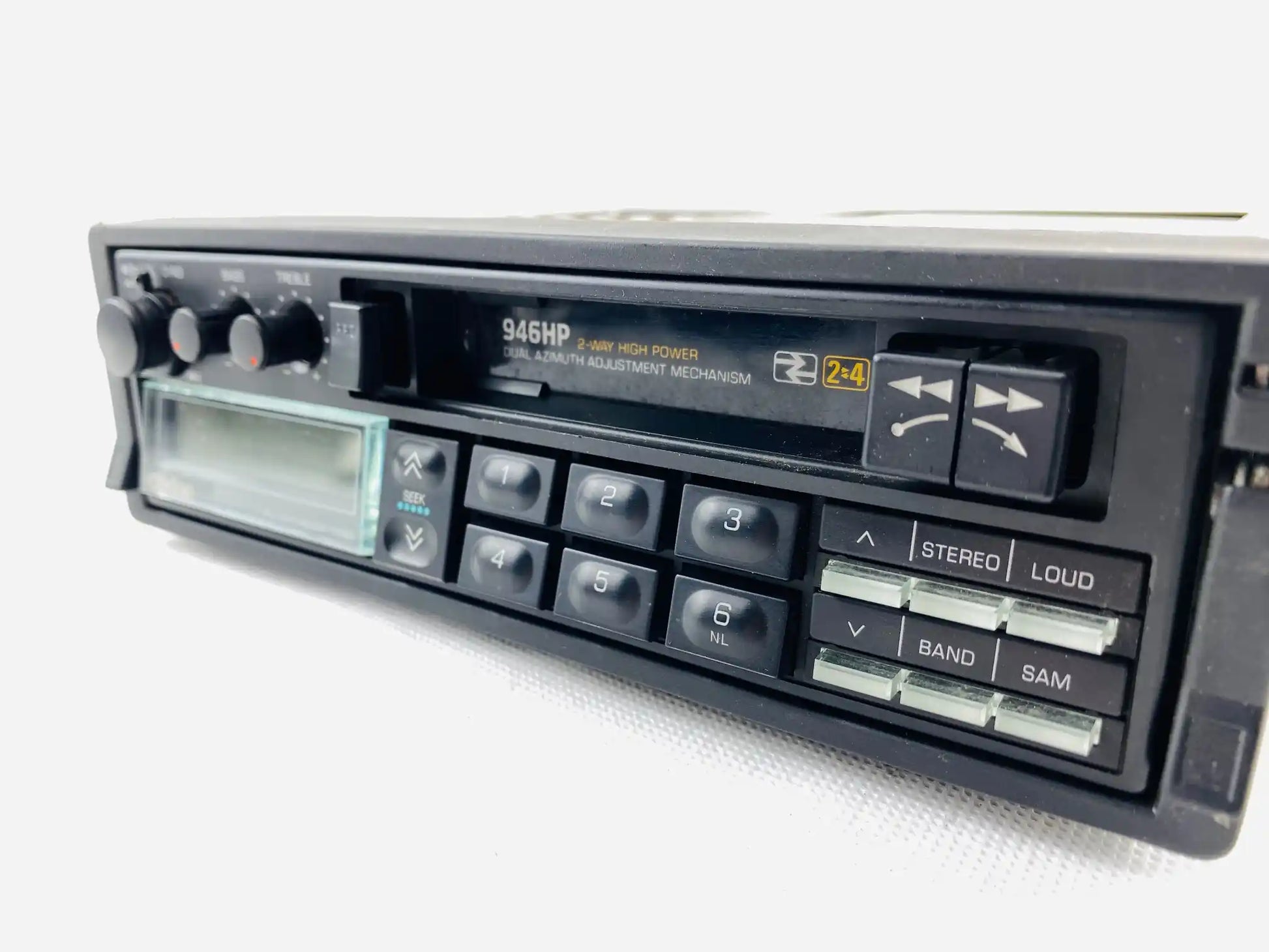 1980s Clarion 946HP car cassette radio player front left angled perspective showing cassette deck and control knobs