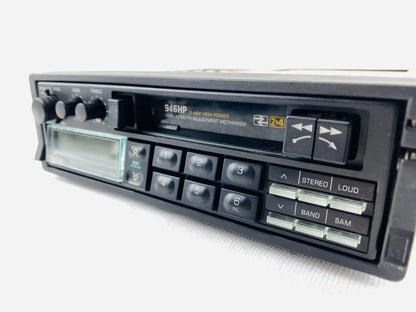 1980s Clarion 946HP car cassette radio player front left angled perspective showing cassette deck and control knobs