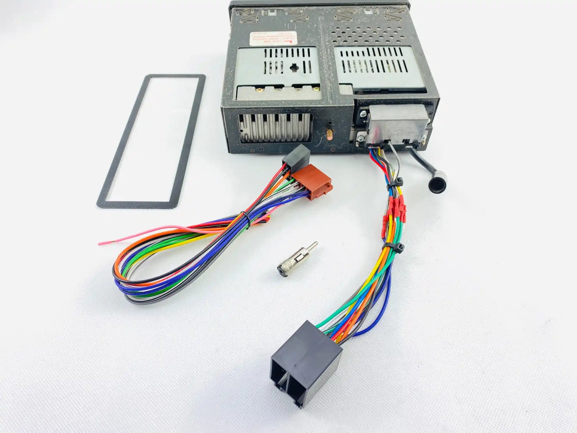1980s Clarion 946HP car cassette radio player rear view showing factory connectors and wiring