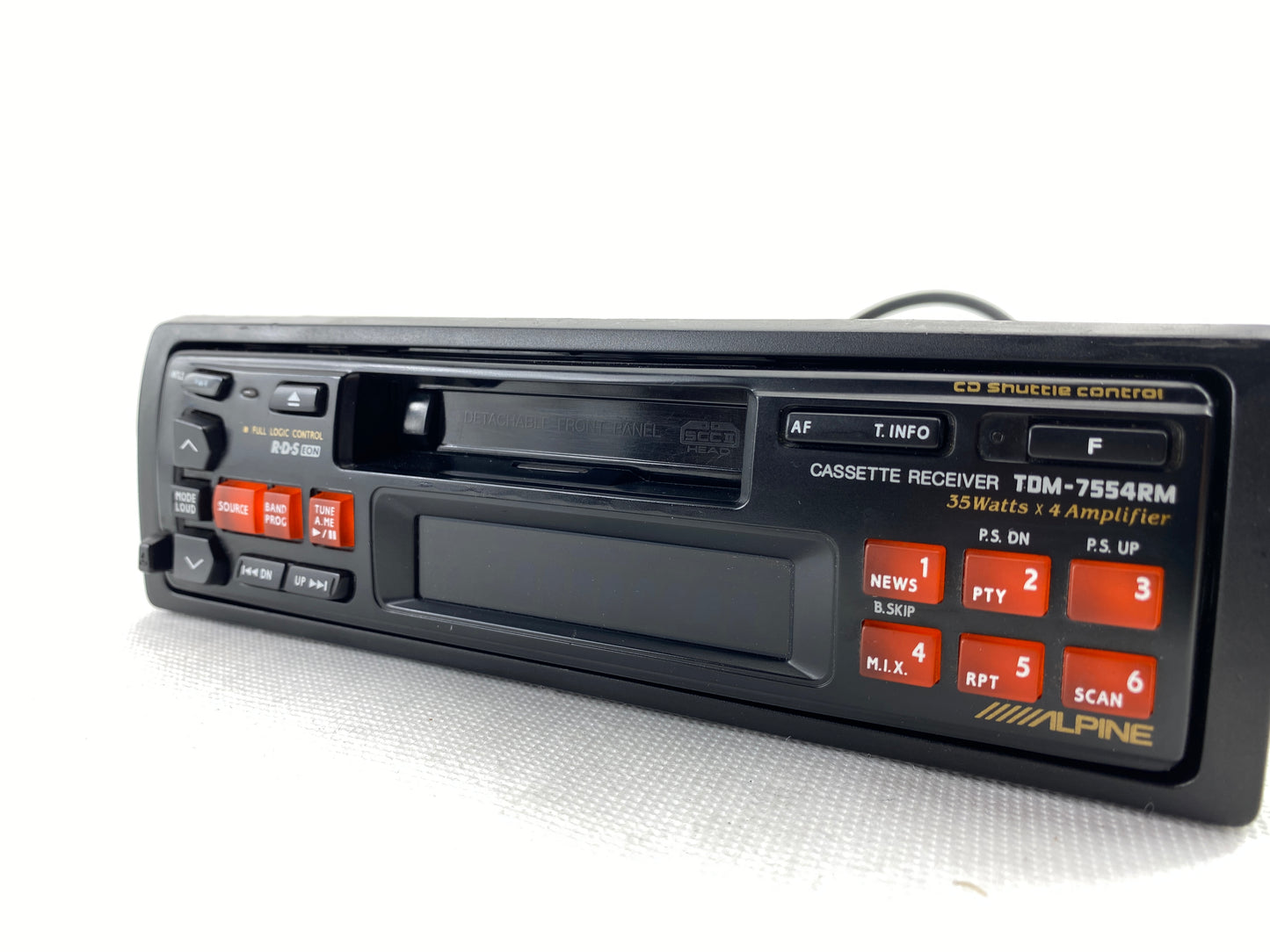 Alpine TDM-7554RM vintage cassette car radio front view with RCA outputs