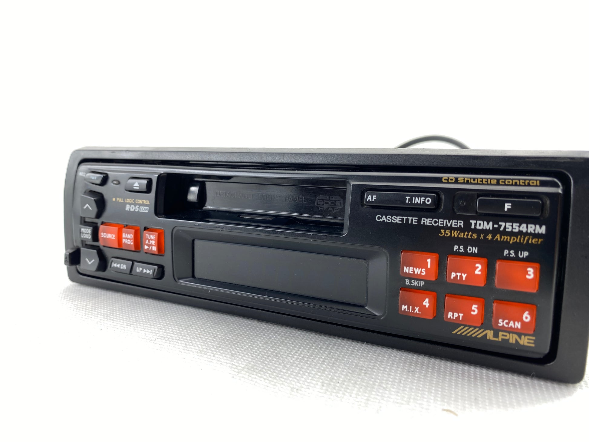 Alpine TDM-7554RM vintage cassette car radio front view with RCA outputs