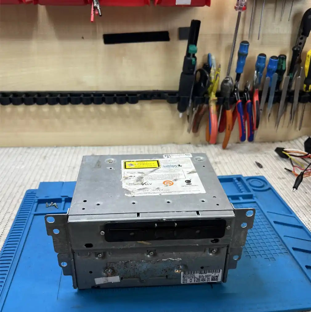 BMW E-series iDrive head unit ready for workshop repair and testing