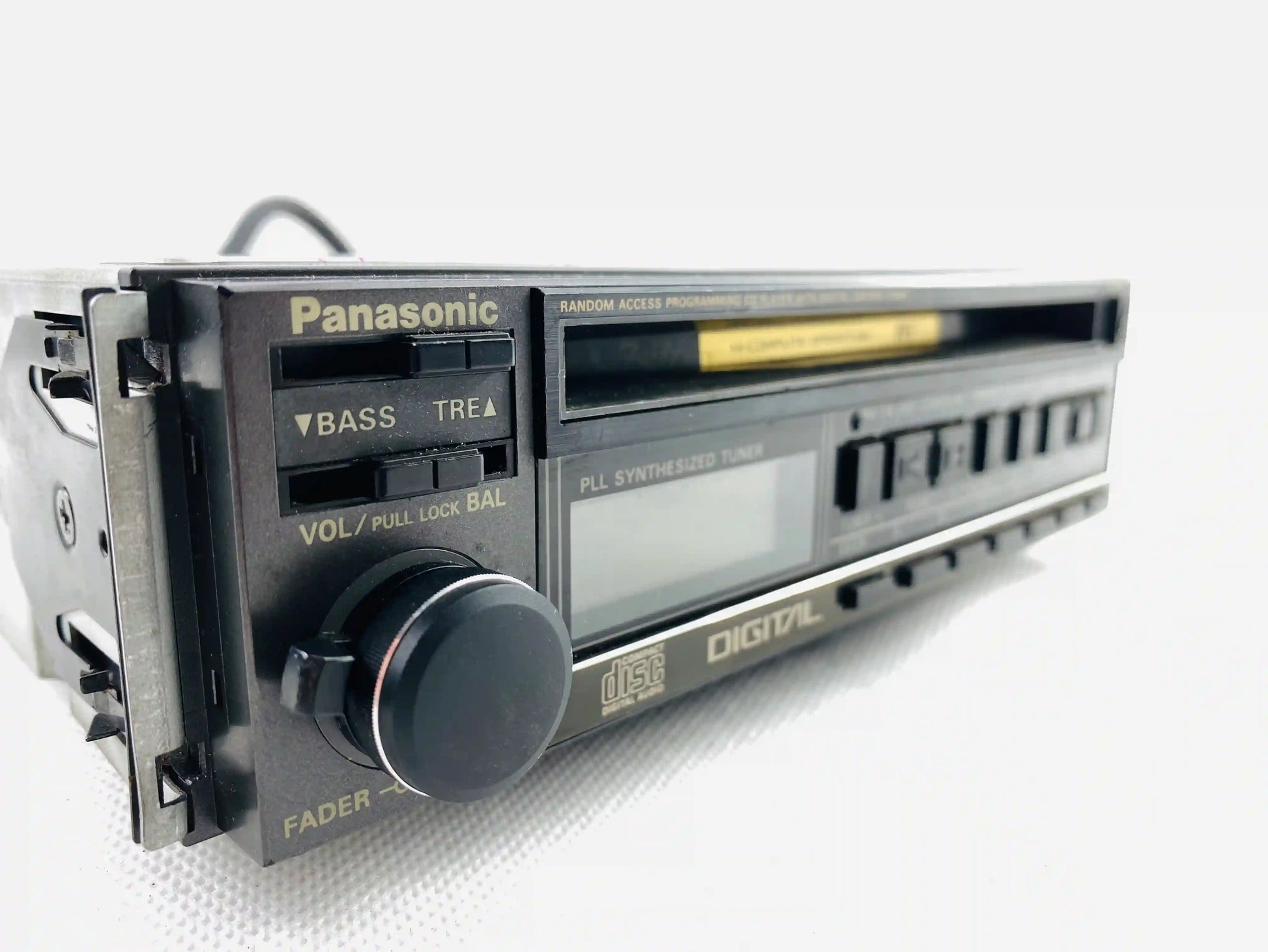 Panasonic CQ-DP5EG car CD radio player left angled view with volume knob