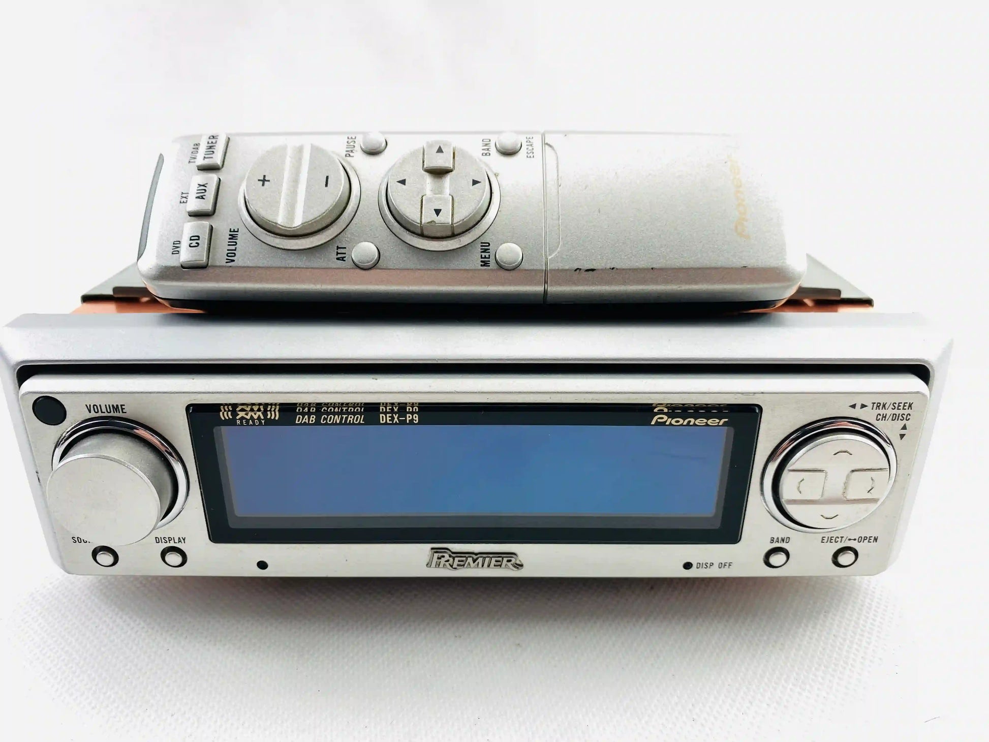 Pioneer DEX-P9 Premiere high end car CD radio straight front view with remote control placed on top