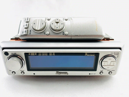Pioneer DEX-P9 Premiere high end car CD radio straight front view with remote control placed on top