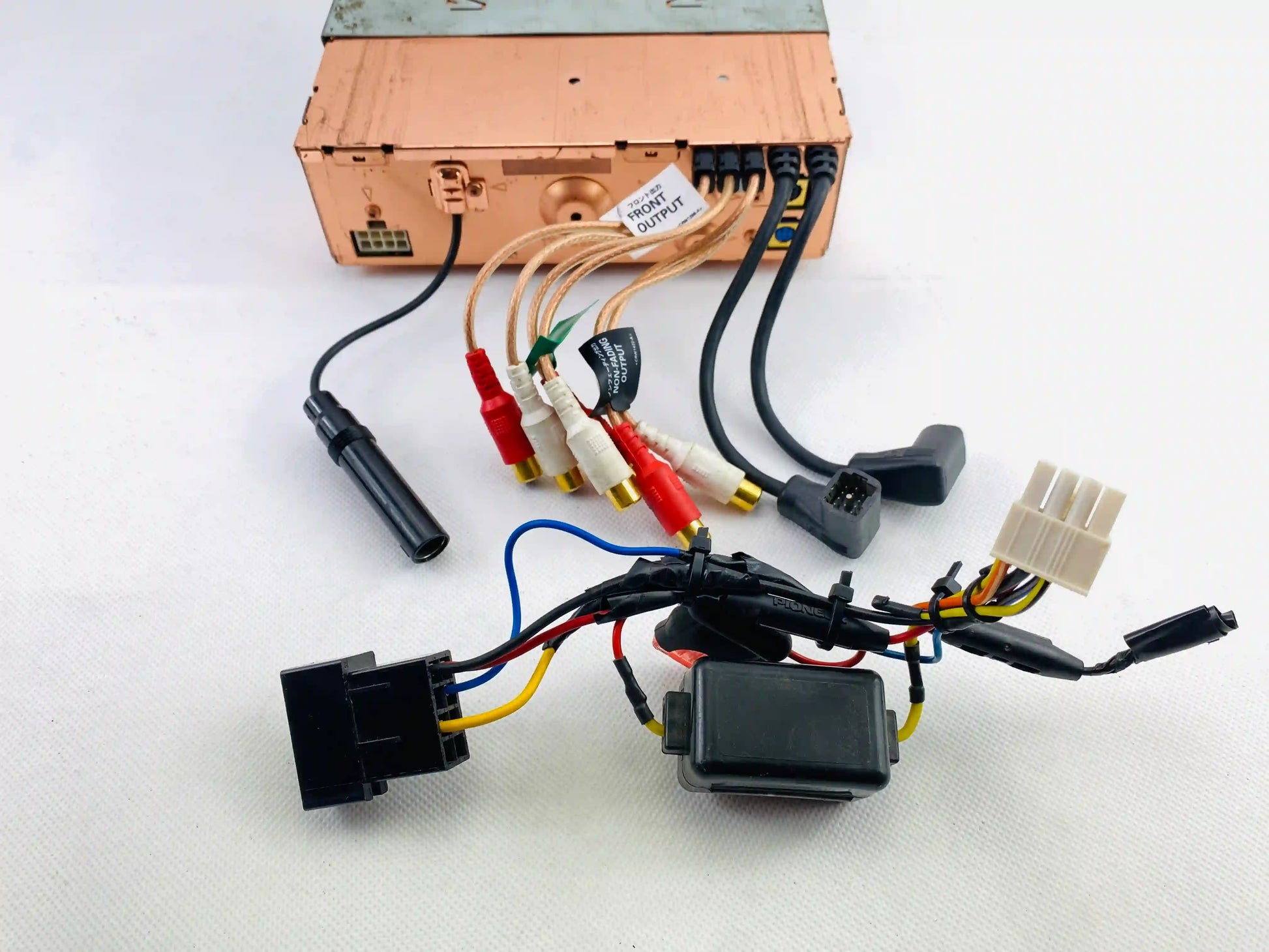 Pioneer DEX-P9 rear view showing RCA outputs wiring harness and connectors