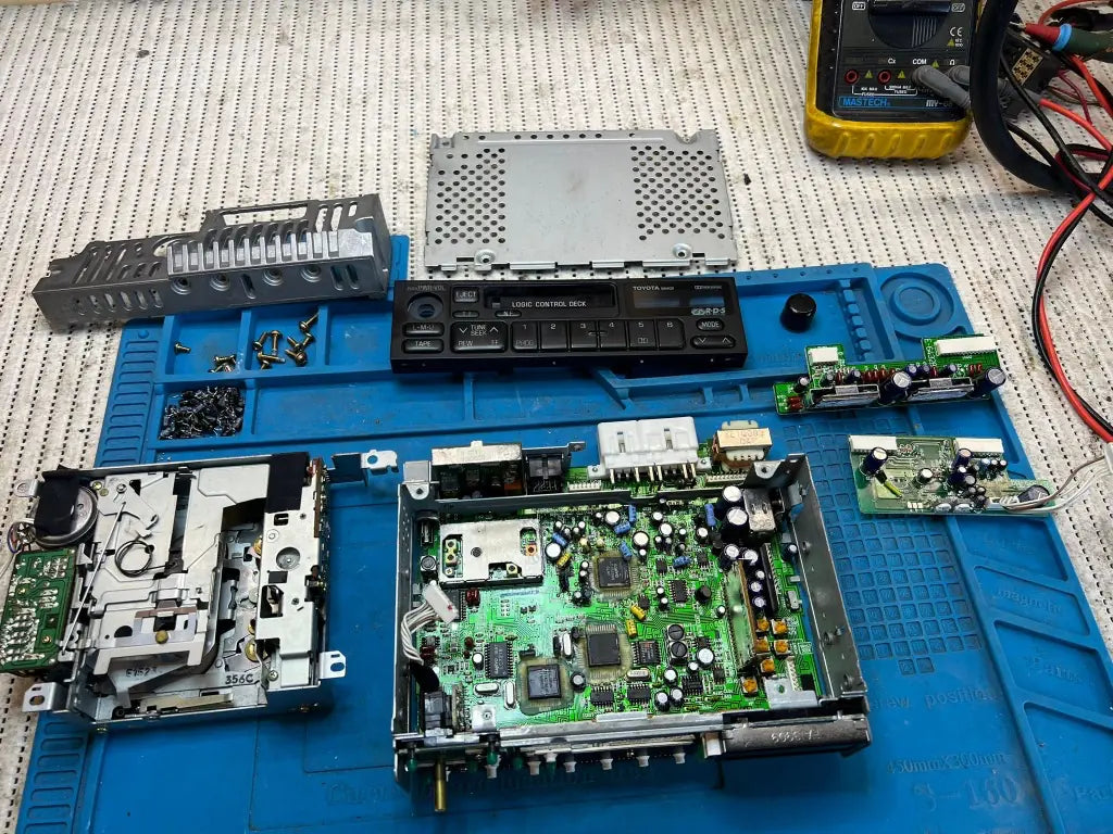 Toyota Land Cruiser factory radio fully disassembled for repair, restoration and Bluetooth retrofit